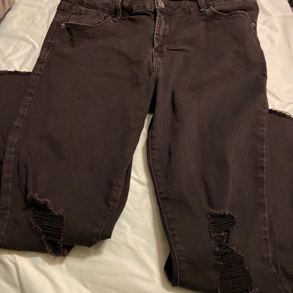 Faded black ripped skinny jeans
